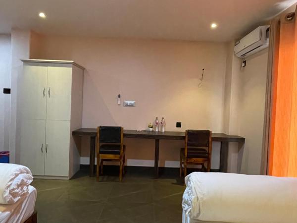 Hostel The Good Earth Pvt. Ltd. : photo 4 de la chambre chambre lits jumeaux - vue sur montagne