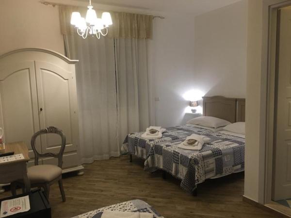 City Garden Guest House : photo 3 de la chambre chambre lits jumeaux avec lit d’appoint - 301