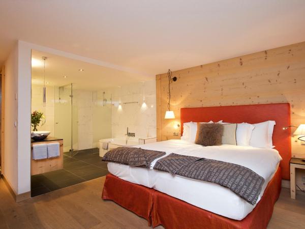 Matterhorn Lodge Boutique Hotel & Apartments : photo 2 de la chambre chalet avec chambre double