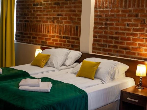 Hotel Artus - Old Town : photo 1 de la chambre chambre triple