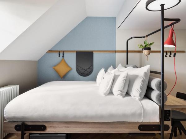 Stay KooooK Bern City - Online Check In : photo 9 de la chambre grande chambre double supérieure