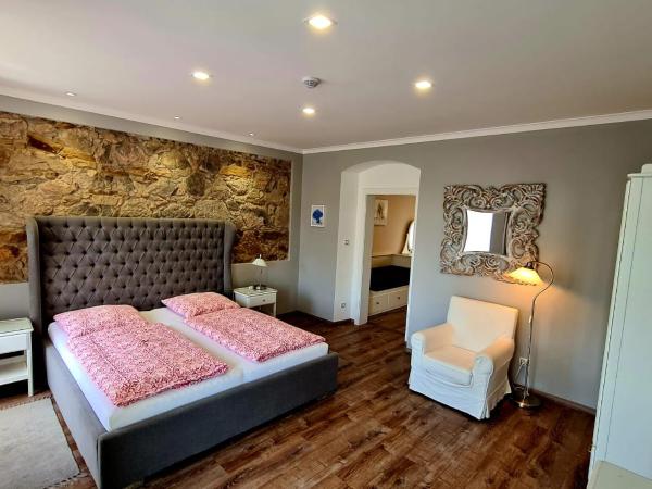 Penzion Valkoun-Lilienfeld : photo 4 de la chambre chambre triple - vue sur jardin