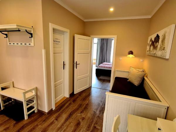 Penzion Valkoun-Lilienfeld : photo 5 de la chambre chambre triple - vue sur jardin