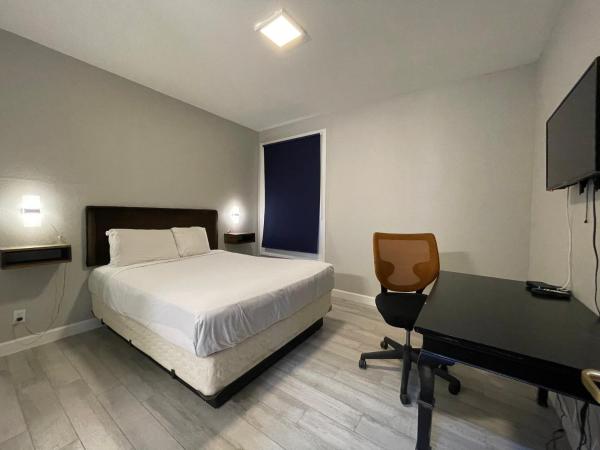 Marina Inn : photo 3 de la chambre chambre lit queen-size