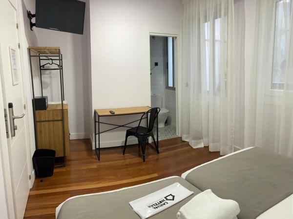 Casual Mardones : photo 7 de la chambre chambre lits jumeaux avec salle de bains privative