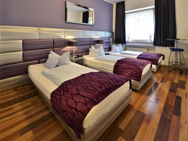 Hotel Am Wehrhahn : photo 2 de la chambre chambre triple