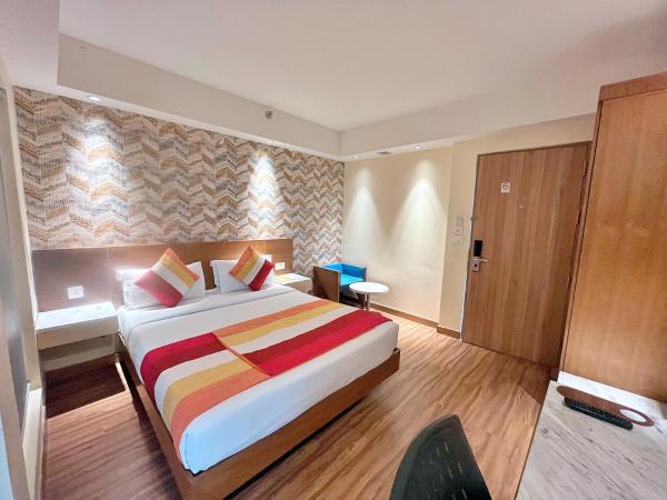 The Orion Plaza - Nehru Place : photo 1 de la chambre chambre deluxe double ou lits jumeaux