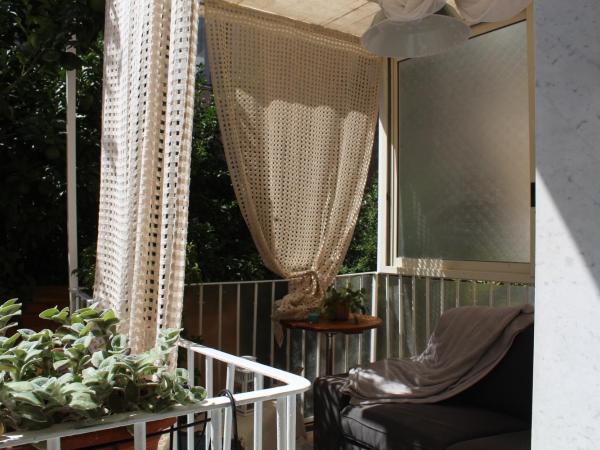 Il Giardino dei Venti : photo 3 de la chambre chambre familiale - vue sur jardin