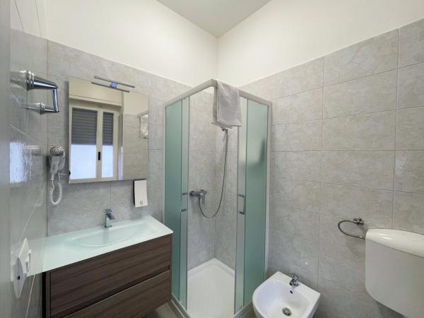 Nuovo Confortini Rooms SUNDAY : photo 8 de la chambre chambre lits jumeaux