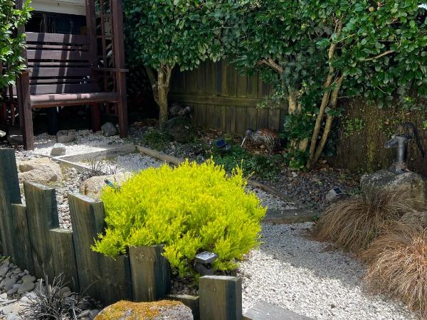 Carly's Place : photo 2 de la chambre chambre lit queen-size - vue sur jardin