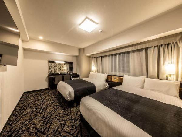 APA Hotel & Resort Osaka Umeda Eki Tower : photo 5 de la chambre chambre lits jumeaux familiale - non-fumeurs