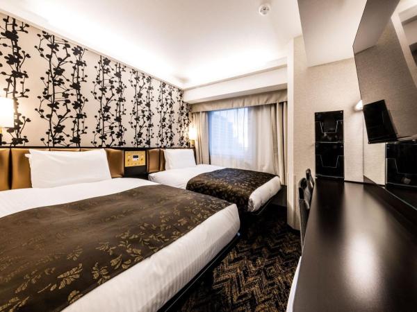 APA Hotel & Resort Osaka Umeda Eki Tower : photo 5 de la chambre chambre lits jumeaux standard - Étage sky - non-fumeurs