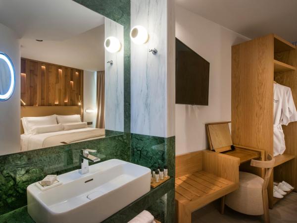 Dimargio Luxury Hotel & Spa : photo 9 de la chambre grande chambre deluxe avec balcon