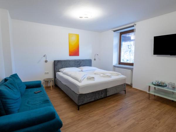 B&B Hotel Heimgartl : photo 1 de la chambre chambre quadruple