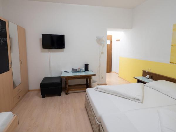 B&B Hotel Heimgartl : photo 2 de la chambre chambre triple