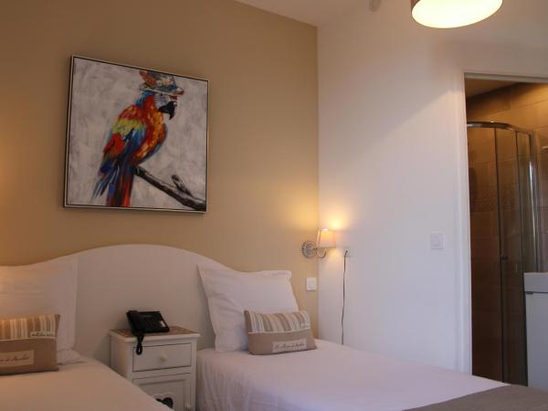 Hôtel La Villa des Oliviers : photo 3 de la chambre hébergement lits jumeaux résidentiel