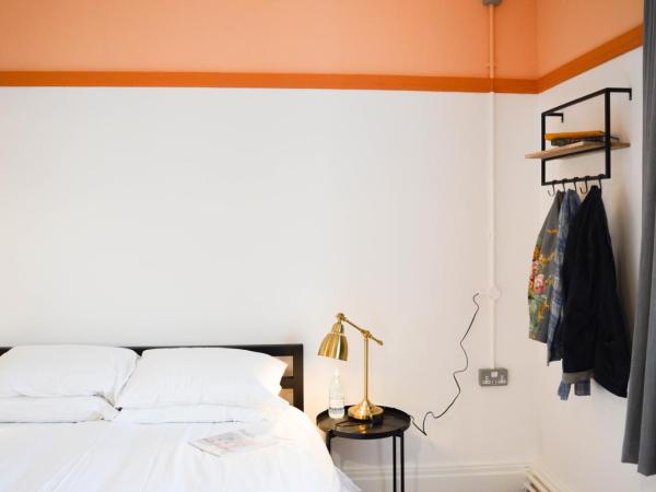 The Bristol Wing : photo 4 de la chambre chambre lit queen-size avec salle de bains commune