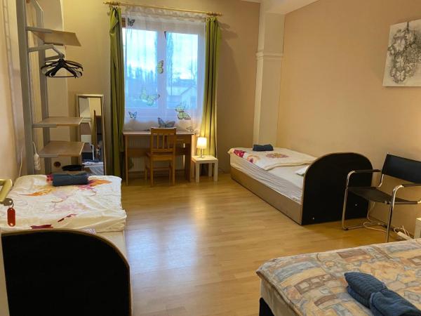 Hermina apartmanház : photo 1 de la chambre chambre triple basique avec salle de bains commune