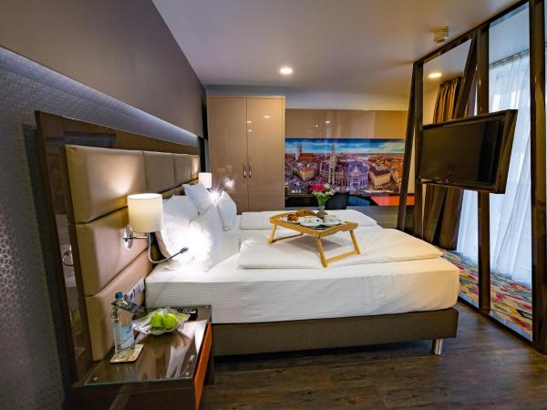 Hotel Kreis Residenz München : photo 4 de la chambre appartement deluxe avec balcon