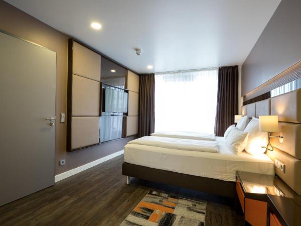 Hotel Kreis Residenz München : photo 5 de la chambre suite exécutive avec balcon