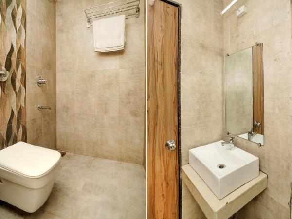 FabExpress Emerald Inn : photo 4 de la chambre chambre deluxe