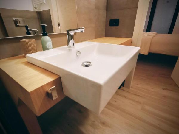 Agriturismo Verdecielo : photo 6 de la chambre chambre triple - vue sur jardin