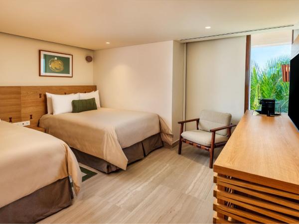 Presidente InterContinental Cozumel Resort & Spa, an IHG Hotel : photo 4 de la chambre suite familiale avec 1 lit king-size et 2 lits doubles - vue sur océan
