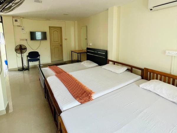 OMAR RESIDENCY : photo 1 de la chambre chambre quadruple Économique