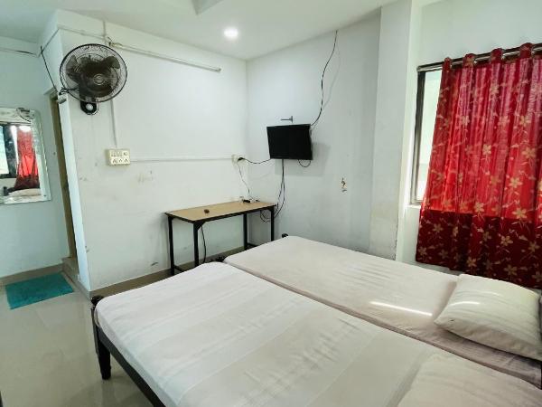 OMAR RESIDENCY : photo 1 de la chambre chambre triple Économique