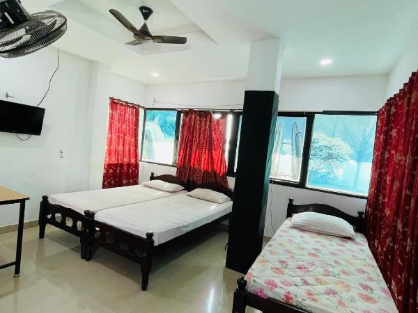 OMAR RESIDENCY : photo 5 de la chambre chambre triple Économique