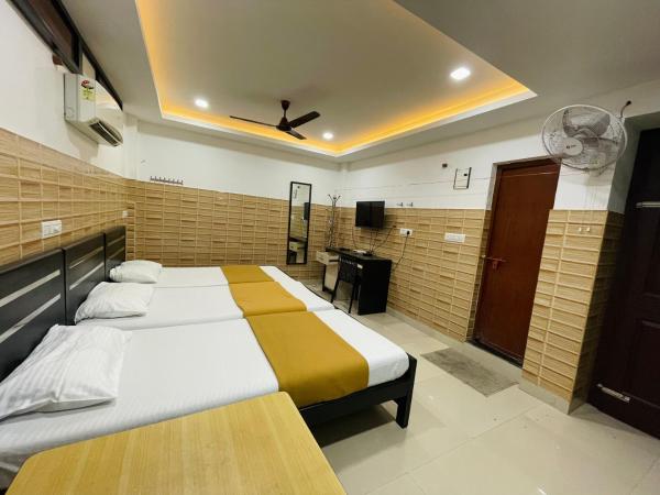 OMAR RESIDENCY : photo 5 de la chambre chambre triple classique