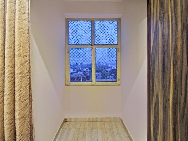 Treebo Rama Hindustani : photo 7 de la chambre chambre double deluxe