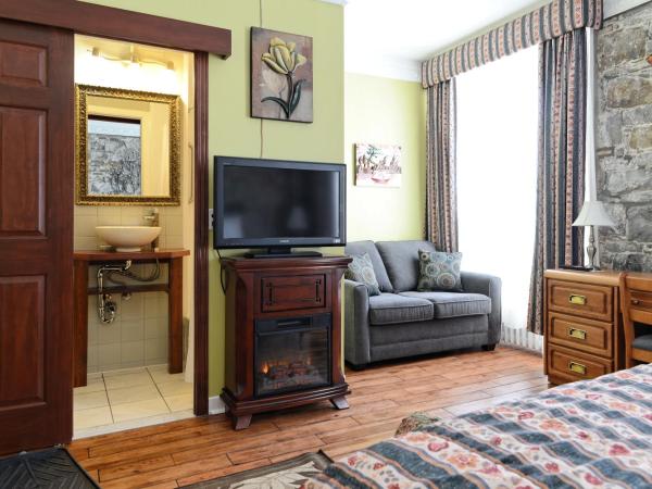 Hôtel Manoir de l'Esplanade : photo 7 de la chambre chambre lit king-size deluxe