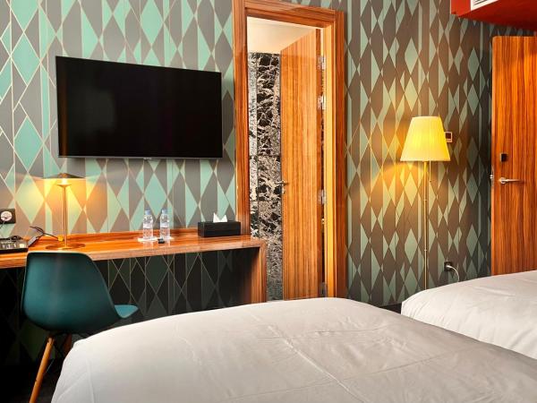 Boutique Hotel Gauthier Restaurant Terrasse : photo 2 de la chambre chambre lits jumeaux supérieure