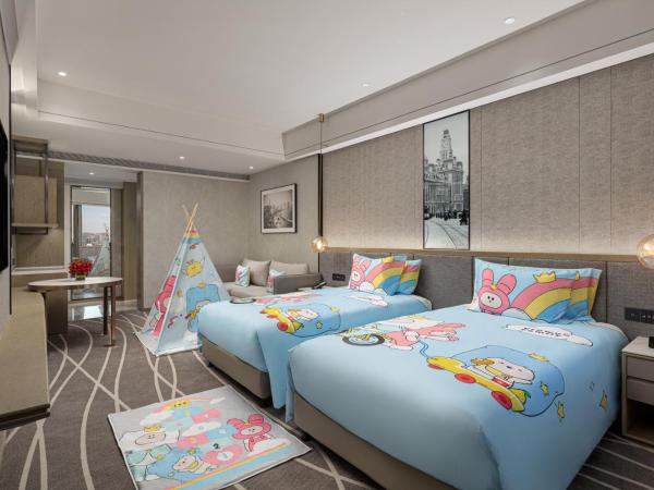 Crowne Plaza Shanghai Nanjing Road, an IHG Hotel : photo 2 de la chambre hébergement lit king-size premium avec canapé-lit - thème enfants