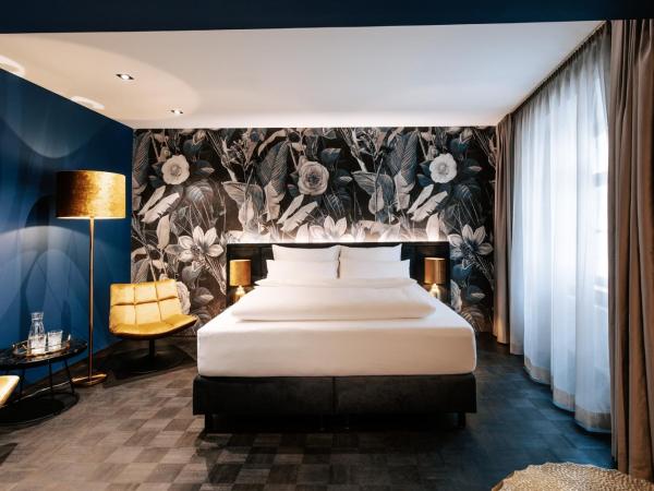 Aiola Living Graz : photo 6 de la chambre chambre double deluxe avec baignoire