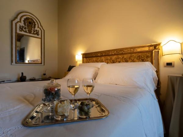 Villa del Gattopardo : photo 1 de la chambre chambre supérieure lit queen-size