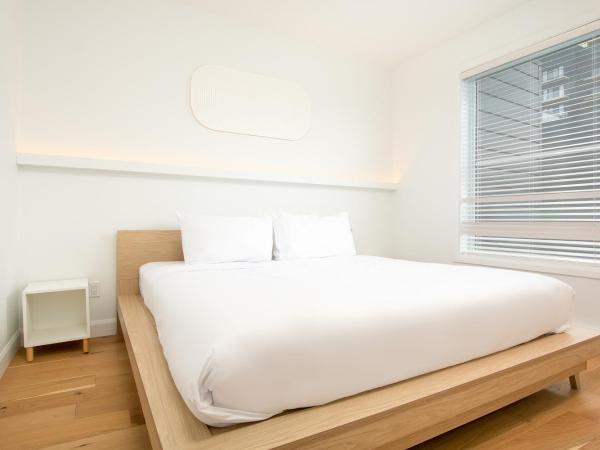 Les Lofts St-François - Par Les Lofts Vieux-Quebec : photo 8 de la chambre appartement 2 chambres avec balcon privé et spa - sf502