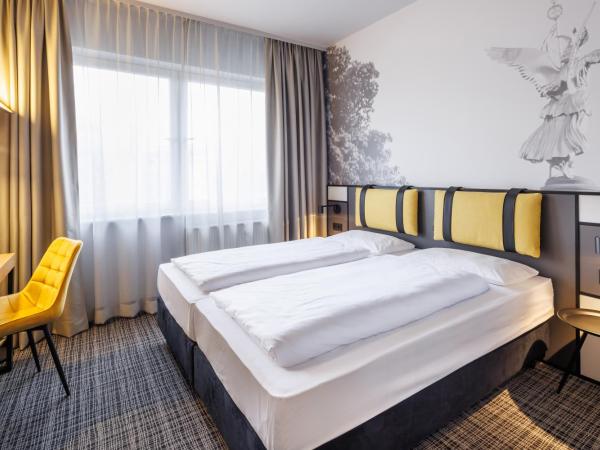 Hotel Lützow : photo 2 de la chambre chambre lits jumeaux urbaine avec kitchenette