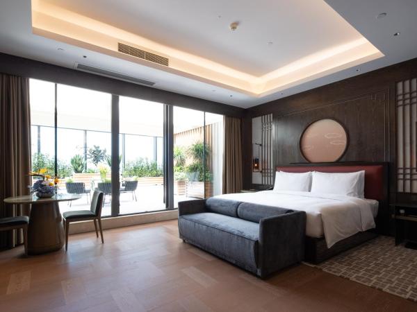 CYNN XANADU Hotel Chengdu : photo 1 de la chambre suite jardin