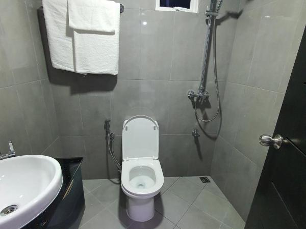 Tour Inn : photo 10 de la chambre chambre deluxe double ou lits jumeaux