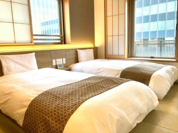 Dormy Inn Premium Ginza : photo 7 de la chambre chambre lits jumeaux avec douche