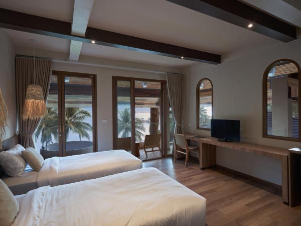 Resolution Resort : photo 4 de la chambre chambre double deluxe avec baignoire