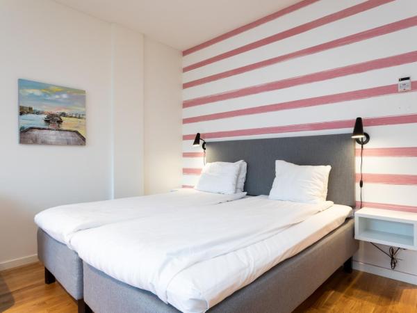 ApartDirect Hammarby Sjöstad : photo 4 de la chambre studio avec canapé-lit