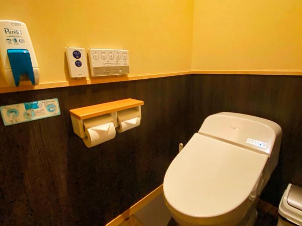 Ryokan Sawaya Honten : photo 8 de la chambre chambre lits jumeaux supérieure - vue sur jardin