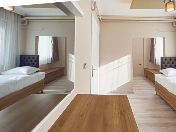 Helen Inn : photo 4 de la chambre chambre triple deluxe