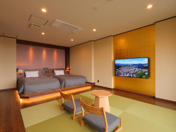 Arima Onsen Taketoritei Maruyama : photo 3 de la chambre suite avec sources chaudes intérieures argent