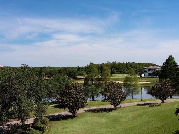 The Ritz-Carlton Orlando, Grande Lakes : photo 8 de la chambre club lounge access, 1 king bed, lake view, guest room
