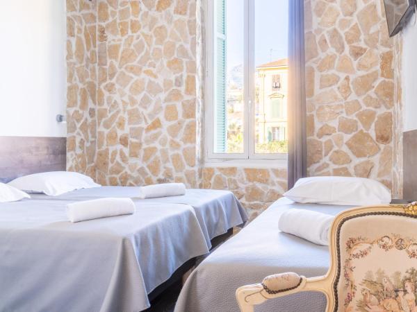 Hotel De Belgique à Menton : photo 3 de la chambre chambre triple