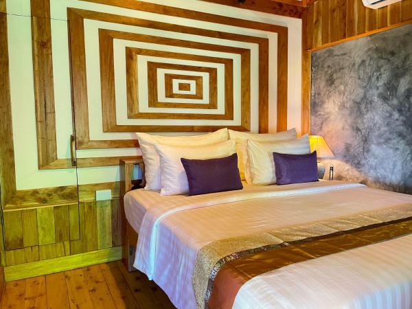 Phi Phi Phu Chalet Resort : photo 7 de la chambre bungalow 2 chambres avec vue sur le jardin